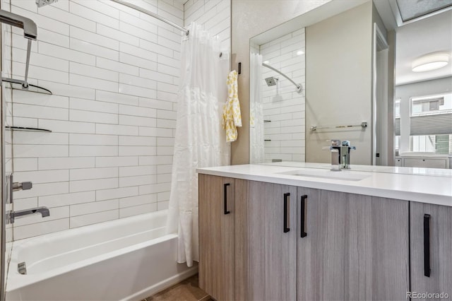 bathroom featuring vanity and shower / bath combo with shower curtain