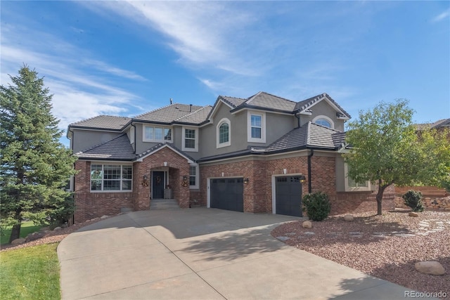 view of front of home with a garage