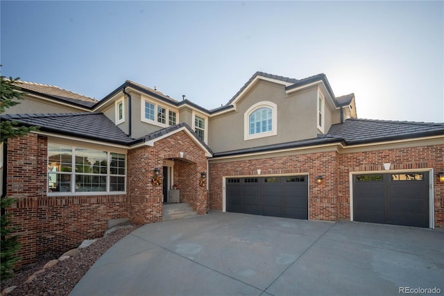 front facade with a garage