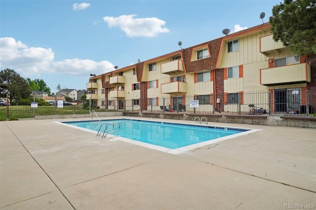 view of pool featuring a patio