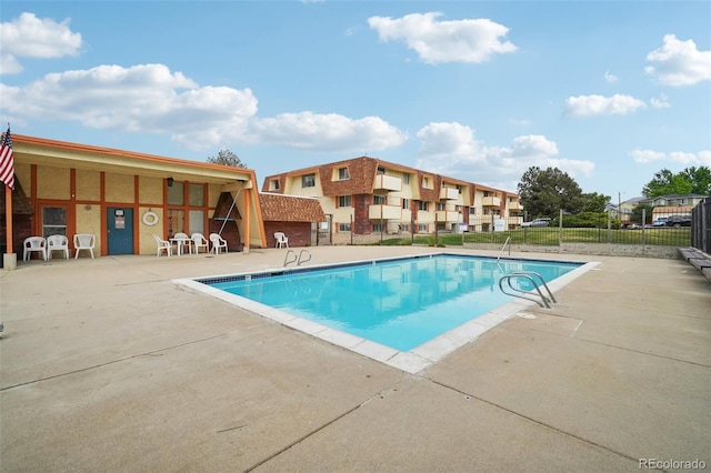 view of pool with a patio area