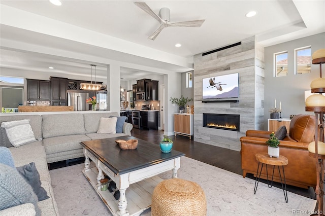 2999 Merry Rest Way, Castle Rock, CO 80109 - living area featuring a ceiling fan, a premium fireplace, recessed lighting, and wood finished floors