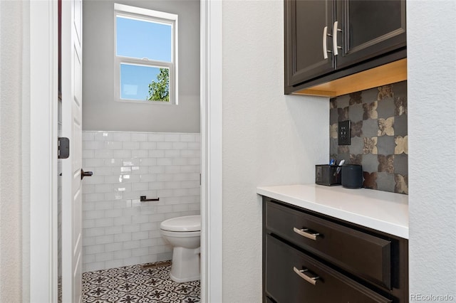 2999 Merry Rest Way, Castle Rock, CO 80109 - bathroom featuring tile walls, tile patterned flooring, and vanity