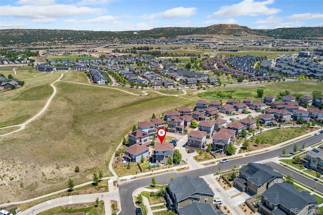 2999 Merry Rest Way, Castle Rock, CO 80109 - aerial view of property's location featuring nearby suburban area and a mountain backdrop