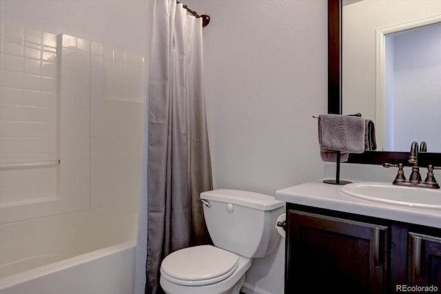 full bath featuring shower / bath combination with curtain, toilet, and vanity