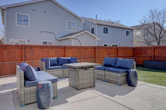 view of patio / terrace featuring an outdoor living space and a fenced backyard