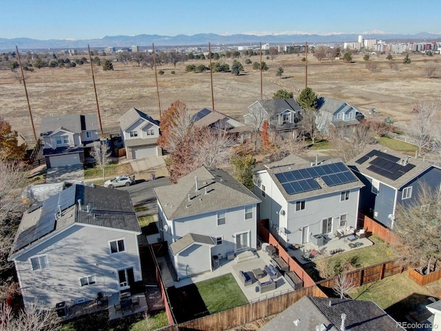 drone / aerial view with a mountain view and a residential view