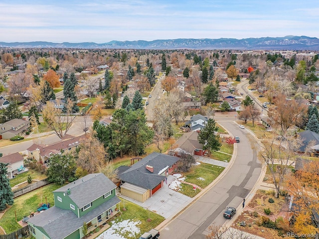 drone / aerial view featuring a mountain view