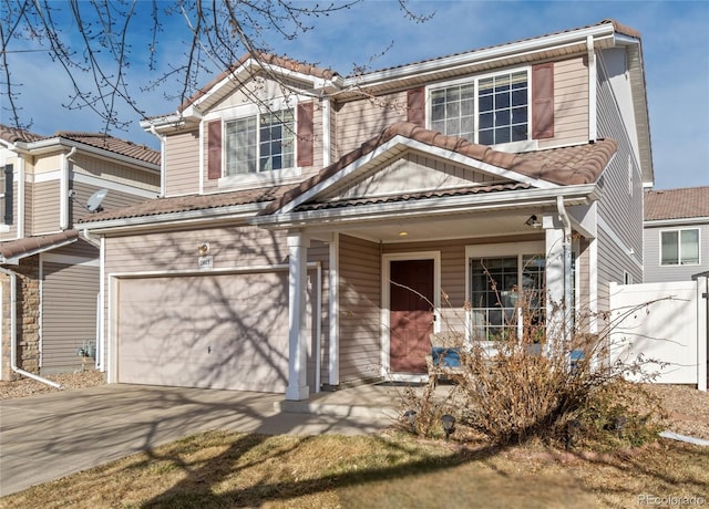 view of front of home with a garage and a porch