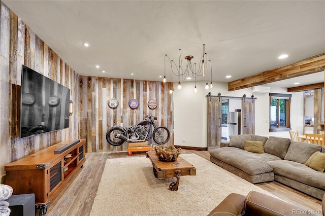 6349 Southridge Greens Blvd, Fort Collins, CO 80525 - living area with recessed lighting, wood finished floors, a barn door, a wall mounted AC, and wooden walls