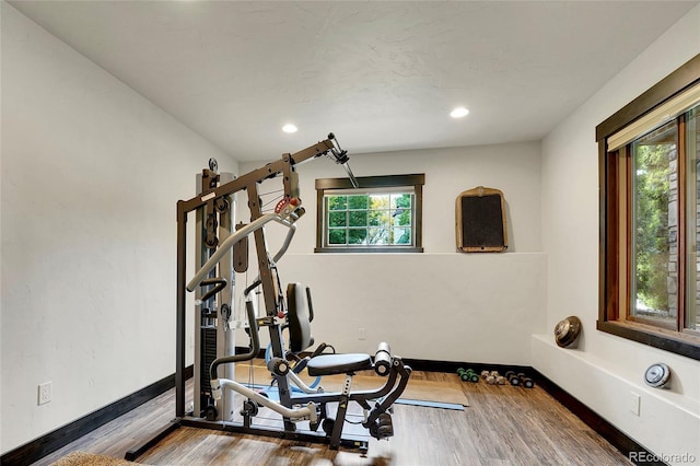 6349 Southridge Greens Blvd, Fort Collins, CO 80525 - exercise room with wood finished floors, baseboards, and recessed lighting