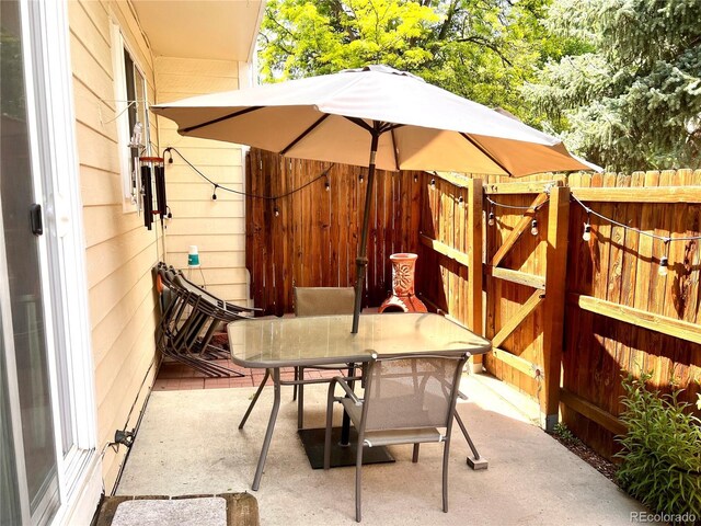 12935 W 64th Dr Unit D, Arvada, CO 80004 - view of patio / terrace with outdoor dining space