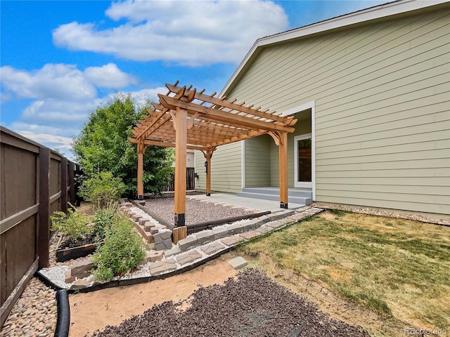 view of yard featuring a pergola and a patio