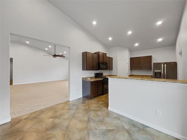 kitchen with ceiling fan, light carpet, dark brown cabinets, and black appliances