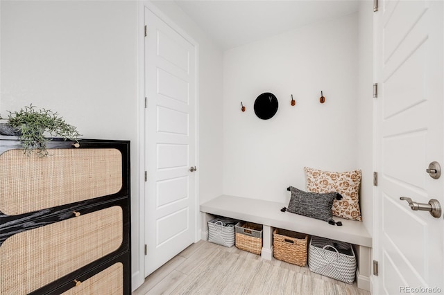 mudroom with light wood-style floors