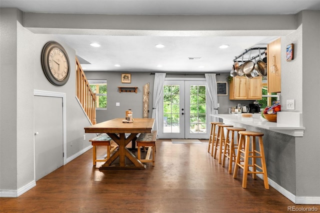 5211 Parmalee Gulch Rd, Indian Hills, CO 80454 - dining area featuring dark wood-type flooring, stairway, french doors, recessed lighting, and a textured wall