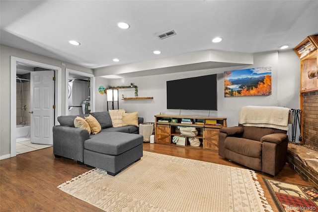 5211 Parmalee Gulch Rd, Indian Hills, CO 80454 - living area featuring wood finished floors and recessed lighting