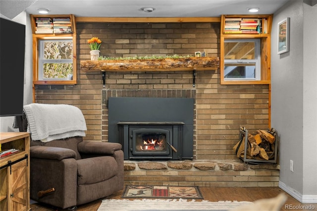 5211 Parmalee Gulch Rd, Indian Hills, CO 80454 - living room with a fireplace and wood finished floors