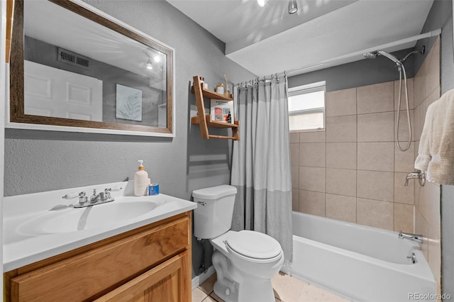 5211 Parmalee Gulch Rd, Indian Hills, CO 80454 - full bathroom featuring shower / bath combo, vanity, a textured wall, and tile patterned floors
