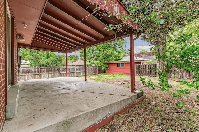 1457 S Franklin St, Denver, CO 80210 - fenced backyard with a patio area
