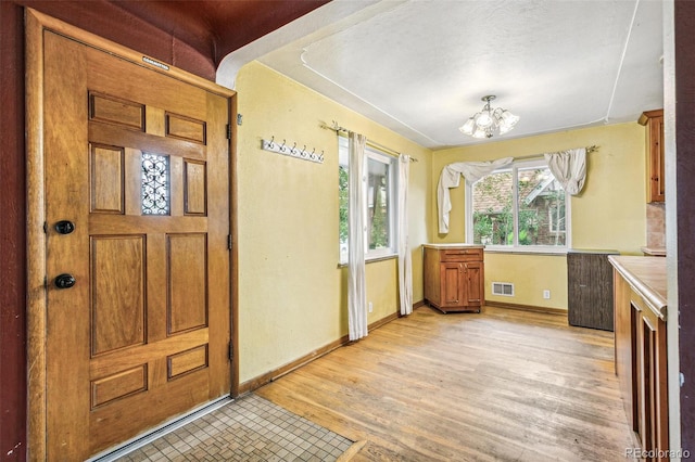 1457 S Franklin St, Denver, CO 80210 - view of exterior entry with a porch