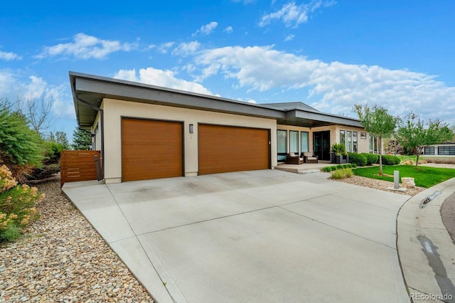 6 Wilder Ln, Littleton, CO 80123 - prairie-style home with driveway and a garage