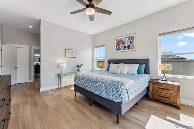 bedroom featuring light wood-style floors, baseboards, a ceiling fan, and recessed lighting