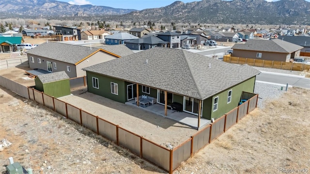 aerial view featuring a residential view and a mountain view