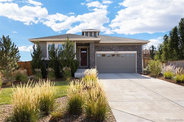 view of front of property with a garage