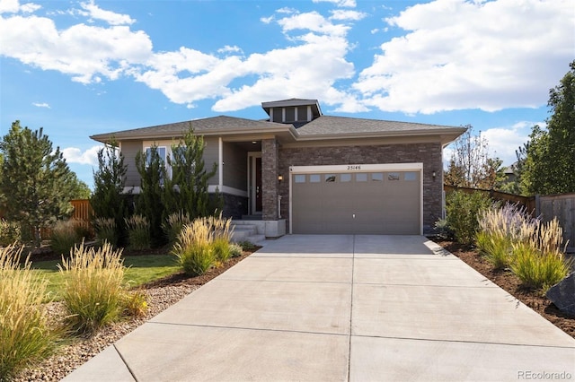 view of front of property featuring a garage