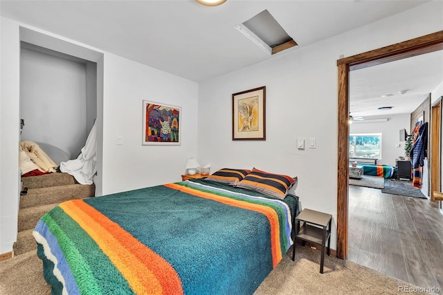 bedroom with wood-type flooring