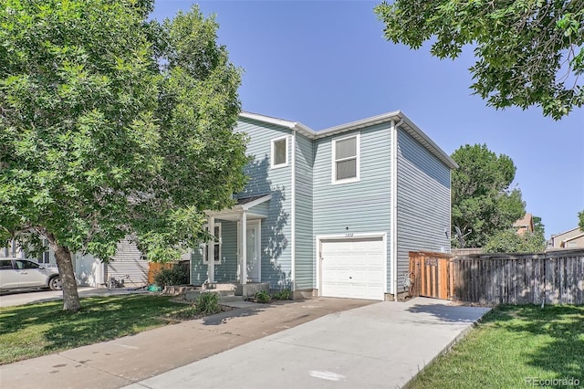 1272 Bluebird St, Brighton, CO 80601 - view of front facade featuring concrete driveway and an attached garage