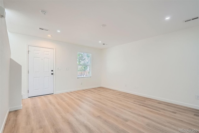 1272 Bluebird St, Brighton, CO 80601 - empty room featuring light wood-style flooring, a smoke detector, and recessed lighting
