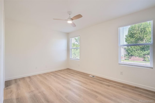 1272 Bluebird St, Brighton, CO 80601 - empty room featuring light wood-style flooring and a ceiling fan