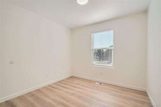 1272 Bluebird St, Brighton, CO 80601 - spare room featuring baseboards and light wood-type flooring