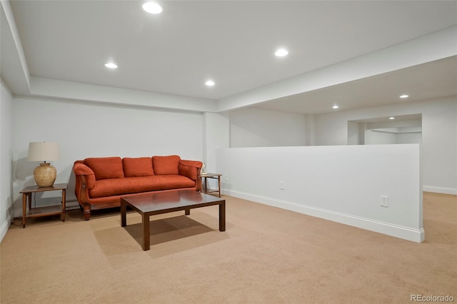 living room featuring light carpet