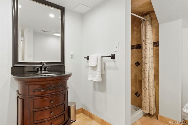 bathroom featuring tile patterned flooring, vanity, and a shower with shower curtain