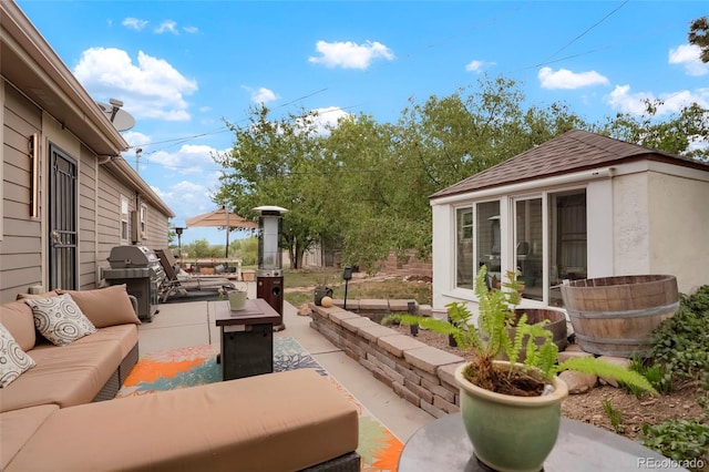 view of patio with an outdoor hangout area and a grill