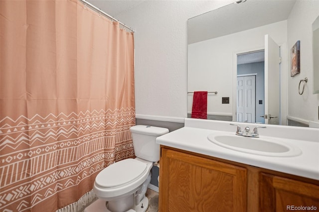 3904 Breaking Dawn St, Colorado Springs, CO 80925 - full bathroom with toilet, vanity, and curtained shower