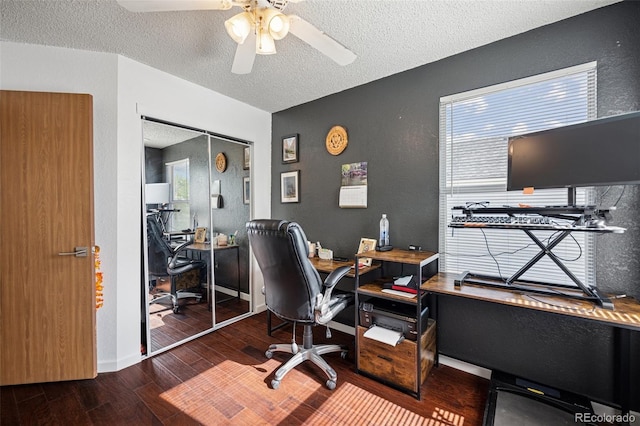 3904 Breaking Dawn St, Colorado Springs, CO 80925 - home office with a textured ceiling, wood finished floors, and a ceiling fan
