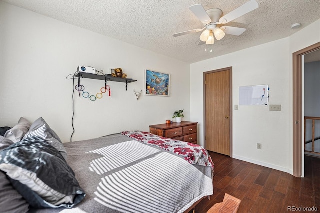 3904 Breaking Dawn St, Colorado Springs, CO 80925 - bedroom with wood finished floors, a textured ceiling, ceiling fan, and baseboards