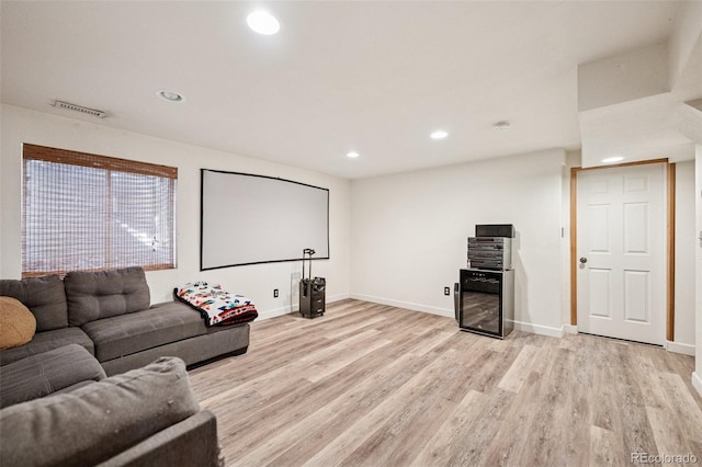 3904 Breaking Dawn St, Colorado Springs, CO 80925 - home theater room with light wood-style flooring, recessed lighting, and baseboards