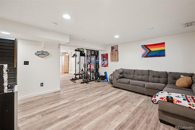 3904 Breaking Dawn St, Colorado Springs, CO 80925 - living room featuring light wood-type flooring, recessed lighting, and baseboards