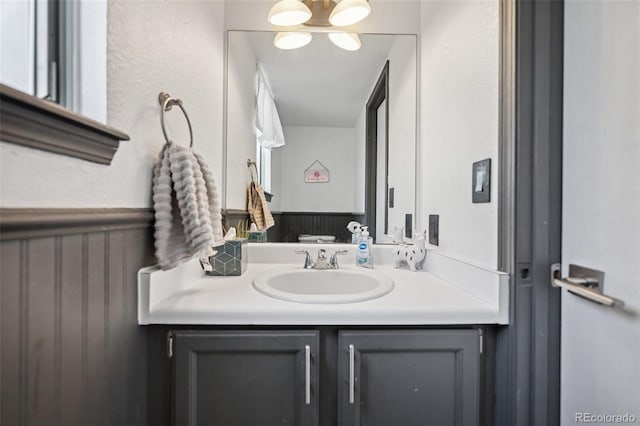 3904 Breaking Dawn St, Colorado Springs, CO 80925 - bathroom featuring vanity and a chandelier
