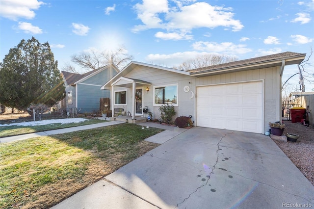 single story home with a front yard and a garage