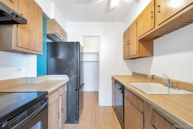 kitchen with ceiling fan, sink, light hardwood / wood-style flooring, black appliances, and exhaust hood