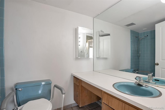 full bathroom with visible vents, vanity, a shower, and toilet