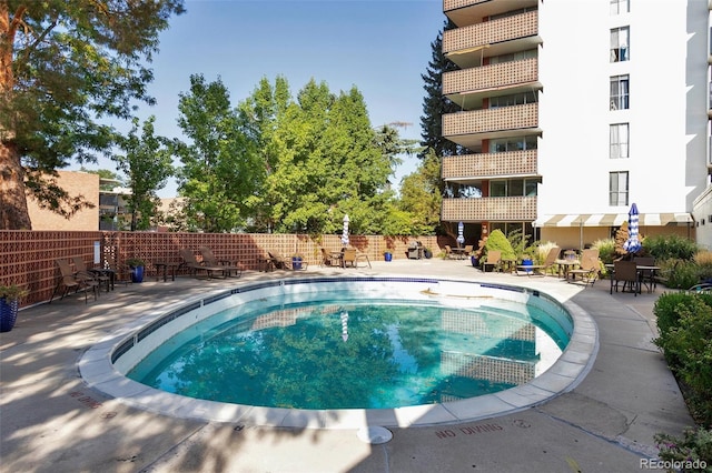 pool with a patio