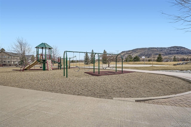 community playground featuring a mountain view