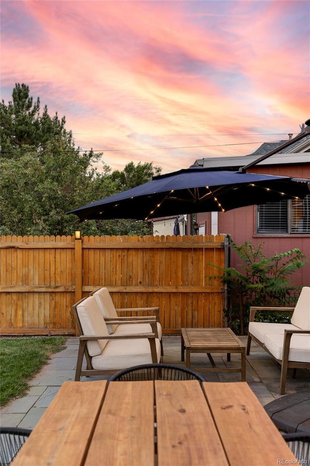 view of patio / terrace with fence and outdoor dining area